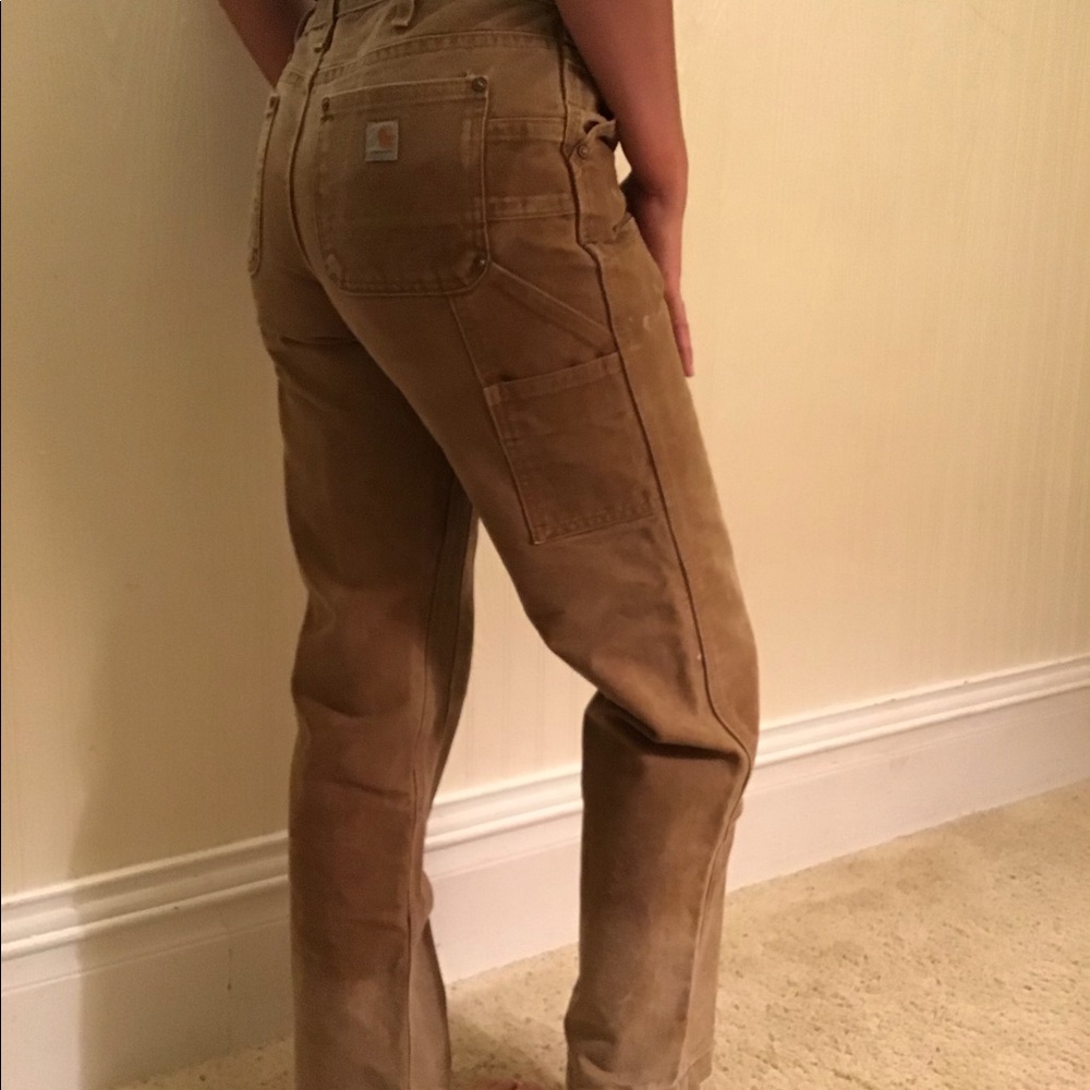 Distressed and altered Carhart work pants